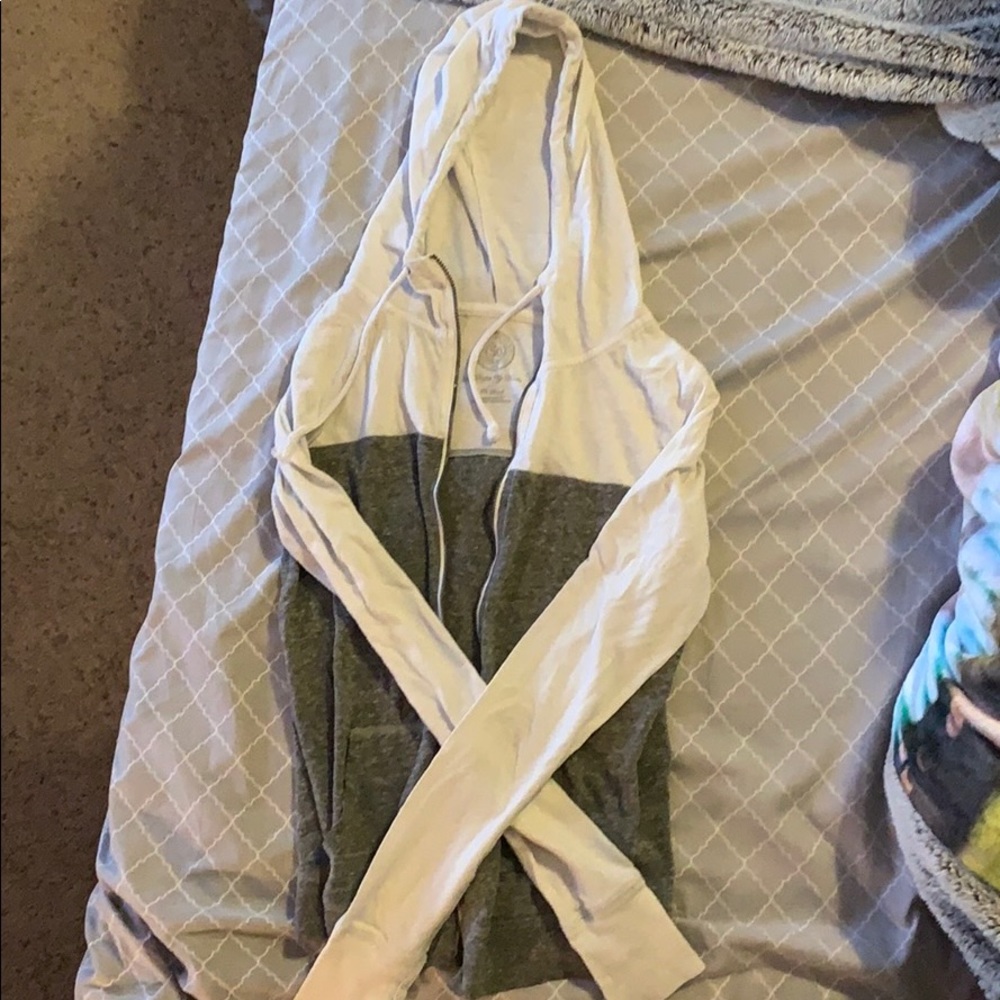 Grey and white throw over jacket